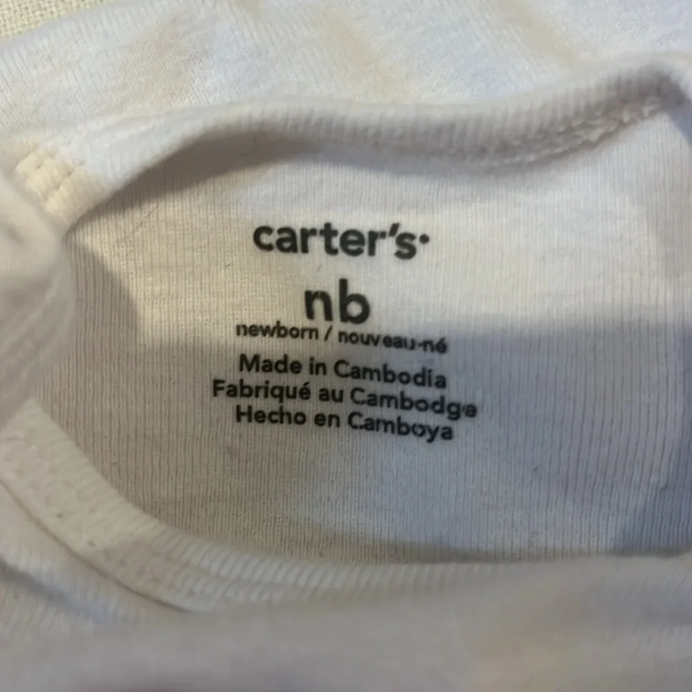 Assorted White Newborn Onesies
